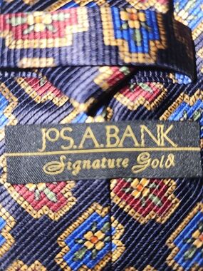 Jos. A. Bank Navy Silk Tie with Gold, Red, Blue & Green Geometric Motif